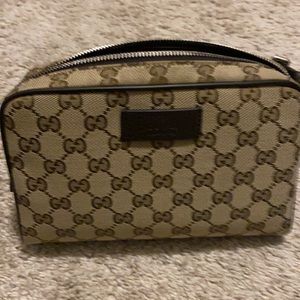 Authentic Gucci monogram belt bag
